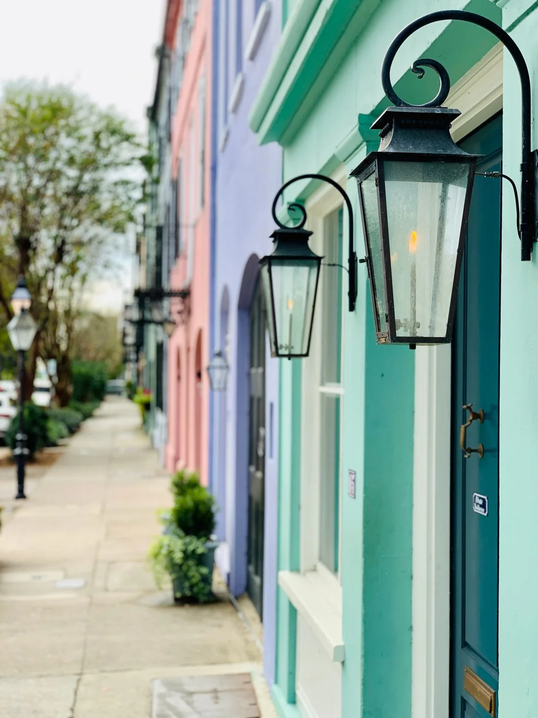 Pastel colored buildings and street lamps in Charleston