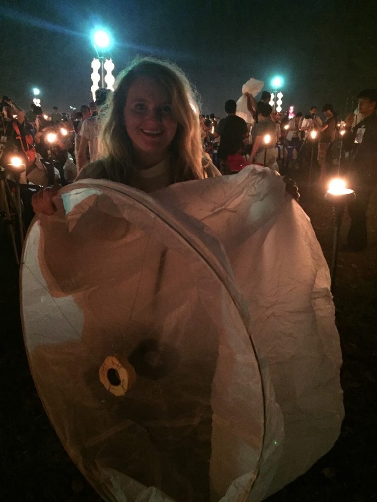 Lighting the lantern at Yee Peng Festival Lighting the lantern at Yee Peng Festival